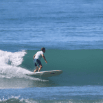 surfer on longboard